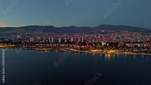 Aerial View of Bostanli Shoreline with City Lights at Twilight Nightfall in Izmir Turkey