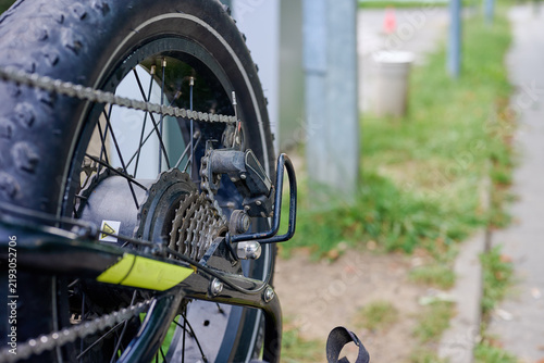 Worn out fatbike tire and rear derailleur detail