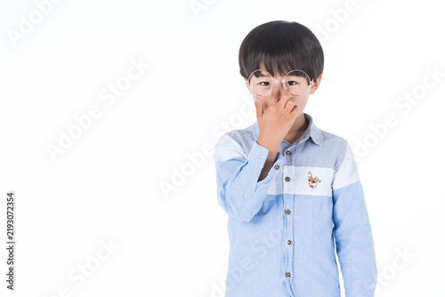 Young Asian Boy Wearing Glasses Adjusting Eyewear on White Background