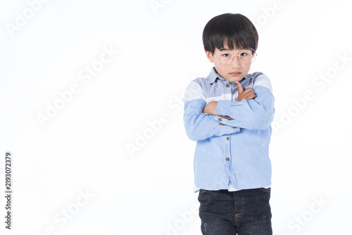 Pensive Young Boy with Glasses and Crossed Arms Thinking
