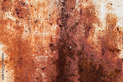 Принти на полотні Close-up view of an aged, rust-covered metal surface showcasing various shades of brown, orange, and reddish tones