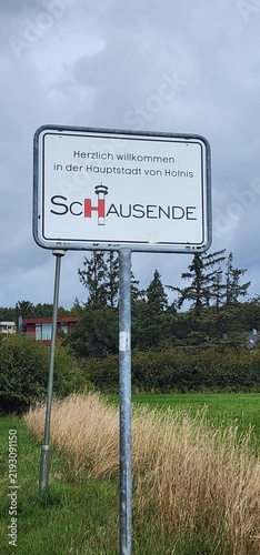 Schausende, Ortsschild