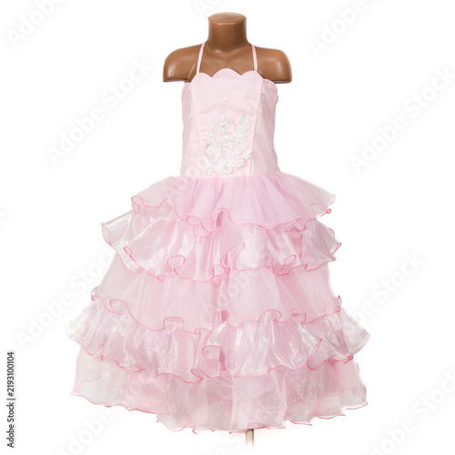 Delicate pink children's party dress with floral embroidery, sparkling fabric and multiple sheer ruffled layers displayed on a mannequin against a white studio background.