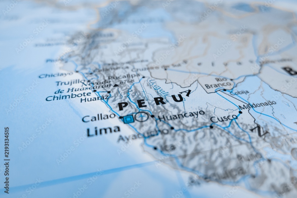 Fototapeta premium Map of Peru styled in grey color. Selective focus on label, close-up view