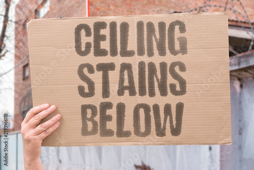 Fotografie "Ceiling stains below" Neighbor downstairs reports water leaking through ceiling