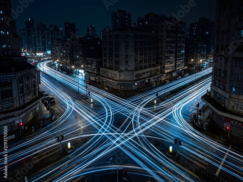 Long exposure night shot of a busy urban intersection in hong kong