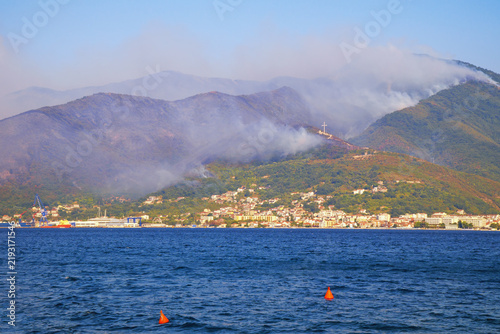 Forest fire in mountains from very hot weather. Montenegro, Bay of Kotor