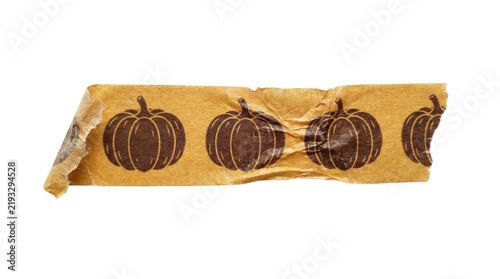 Orange pumpkin patterned washi tape with torn edges, useful for scrapbooking, journaling, and autumn-themed crafts.