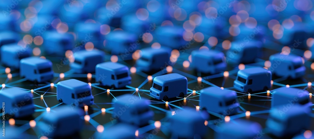 Fototapeta premium Cargo vans connected by luminous network lines symbolizing commercial logistics technology