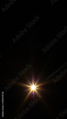 Sun flare on the black background