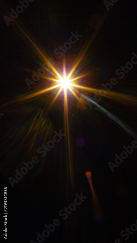 Sun flare on the black background