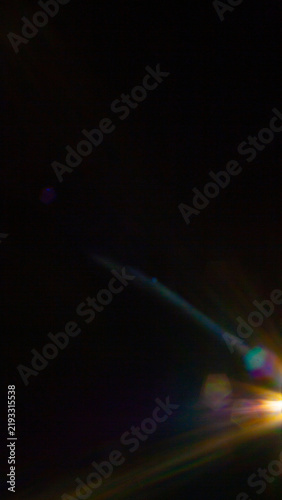 Sun flare on the black background