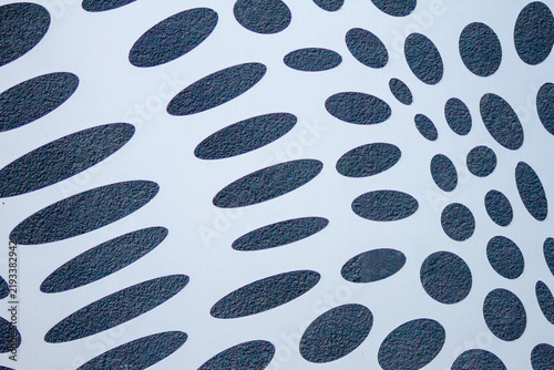 Cuadro en lienzo Abstract optical illusion pattern of dark oval dots on white background