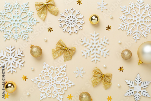 Christmas composition with snowflakes on color background, top view