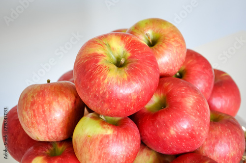 Red apples on a white background