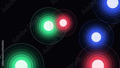 Concentric circles glowing with vibrant gradients in a dark void representing communication or energy transfer