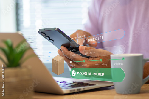 Person checking package delivery status on smartphone with augmented reality overlay. Showing tracking number. Logistics updates. And package delivered notification