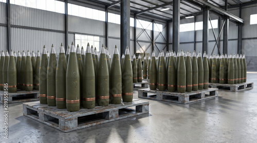 Large stockpile of artillery ammunition arranged on pallets inside military storage warehouse.