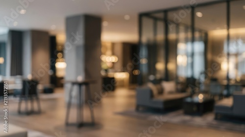 Out of focus view of a high end hotel lobby interior with comfortable furniture