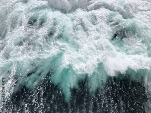 фотографія Large Ocean Waves Viewed From Cruise Ship Deck on Sunny Day, Teal Water and Whit