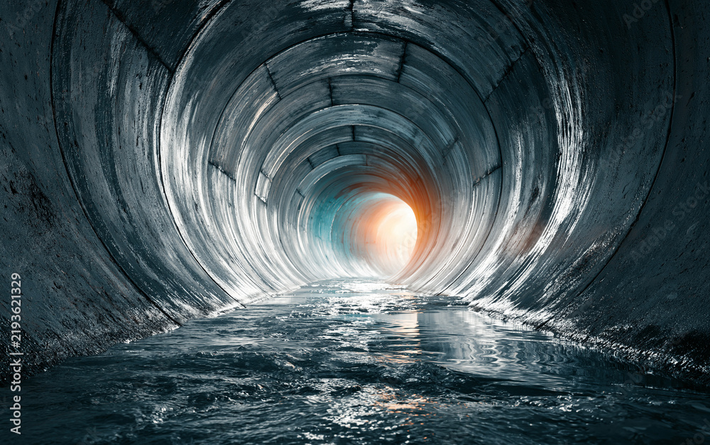 Fototapeta premium A dark underground sewer tunnel with wastewater flowing inside a round concrete pipe.