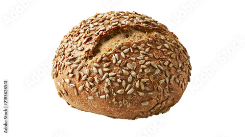 Fotografie Isolated fresh whole grain bread roll with crunchy sunflower seeds on top, delicious and healthy bakery product