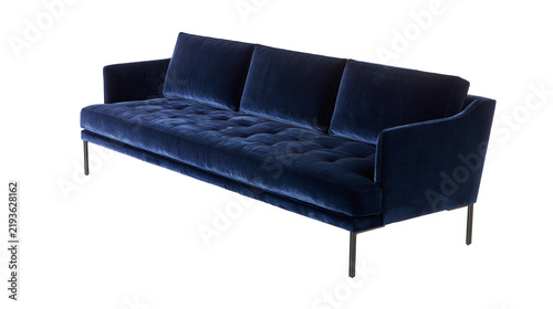 Foto Isolated dark blue velvet sofa, modern three-seater furniture with tufted seat and metal legs