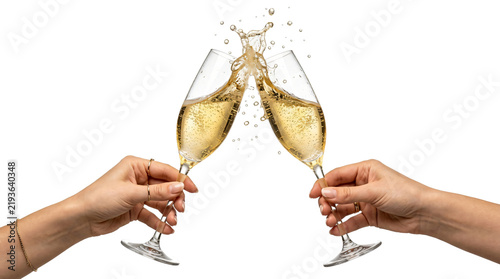 Fotografie Sparkling golden champagne flutes clinking together with elegant splashes of fiz