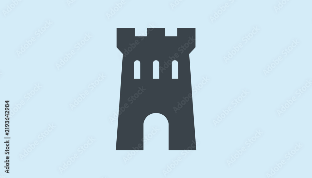Obraz premium Simple grey silhouette of a fortified castle tower with windows and an arched entrance against a light blue background.