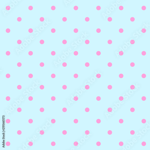 Pink polka dot pattern on a light blue background  