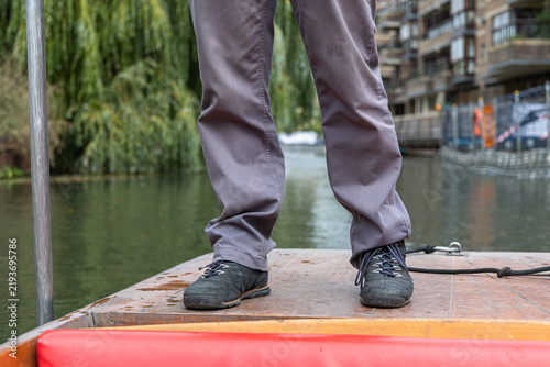 Foto Punter standing on a traditional punt boat