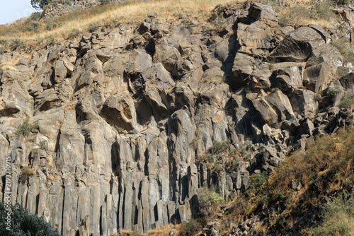 Obraz na plátně Geological formations of basalt columns in Armenia, with distinct rock textures