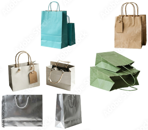 Fotografie A set of assorted blank retail shopping bags in different colors, materials, and sizes for packaging mockups