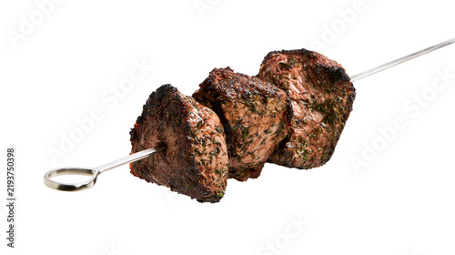 фотографія Isolated delicious savory grilled beef shish kebab skewer, succulent cooked meat