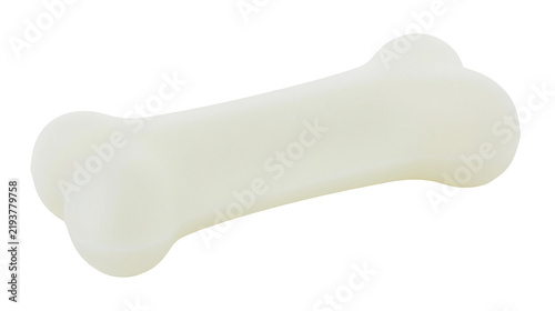Bild auf Leinwand Isolated light colored pet chew toy shaped like a bone, a happy dog's favorite