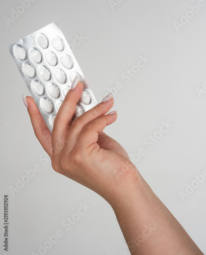 фотографія Pills in hand for medical routine