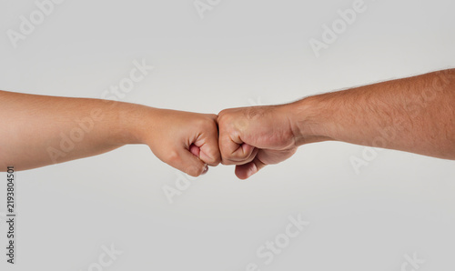 Bild auf Leinwand Fist bump builds trust and teamwork