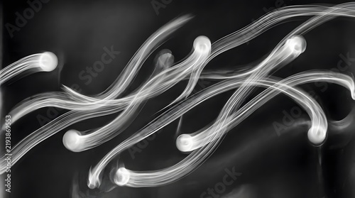 Abstract microscopic organisms or sperm cells swimming with black and white microscopic organism abstract microscope bacteria