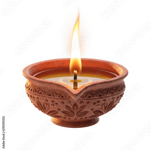 Traditional clay diya with burning flame, decorative terracotta oil lamp for Diwali celebration, spiritual lit candle in ornate earthen pot isolated on white