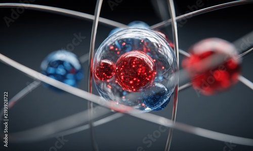 Abstract scientific visualization of an atomic structure with glowing red and blue particles orbiting a central nucleus against a dark background