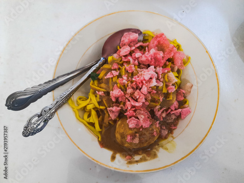 Mie Pical, Traditional Minangkabau Noodle Dish with Peanut Sauce, Boiled Egg and Red Crackers