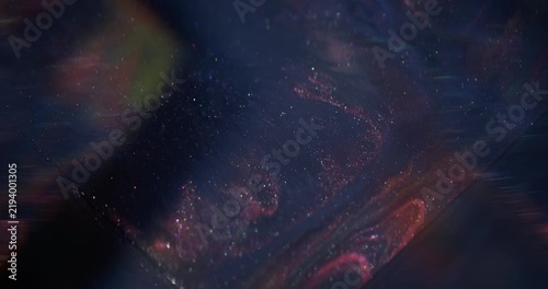 Shiny ink. Acrylic flow. Blur blue purple color mix sparkling flare texture glitter fluid floating on abstract radiant background.
