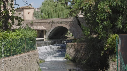 Bevagna , Italy , the waters of the Clitunno river with waterfall