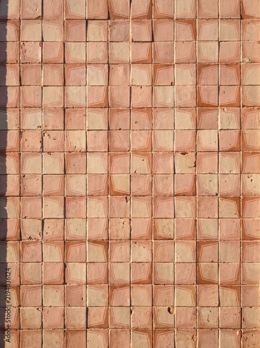 Vintage Geometric Ceramic Tile Wall Texture Background with Warm Terracotta and Beige Repeating Pattern, Retro Architectural Surface Design for Interior Decoration, Exterior Facade, and Graphic Backdr