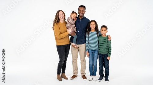 Happy multiethnic family of five standing together and smiling at the camera isolated on white background