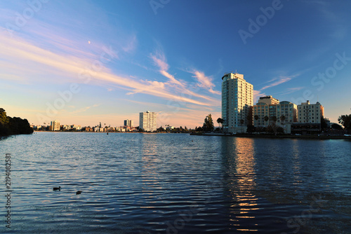 Tranquil Lake and Oakland Cityscape