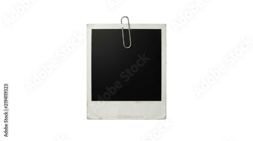 Vintage blank polaroid photo frame with a metal paper clip isolated on transparent background