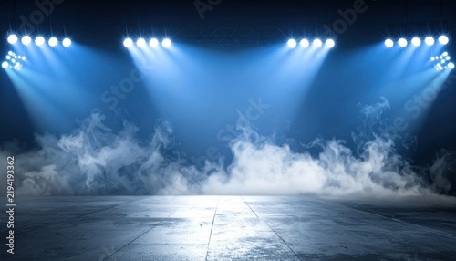Empty Stage With Blue Spotlights and Smoke Clouds