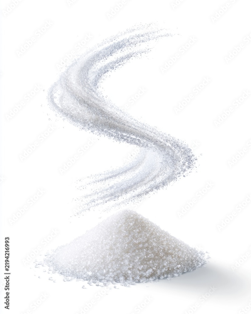 Fototapeta premium A pile of white granulated salt with a flowing stream of salt pouring down in a smooth curve on a white background.