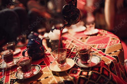 Pouring traditional egyptian hibiscus tea in marsa alam